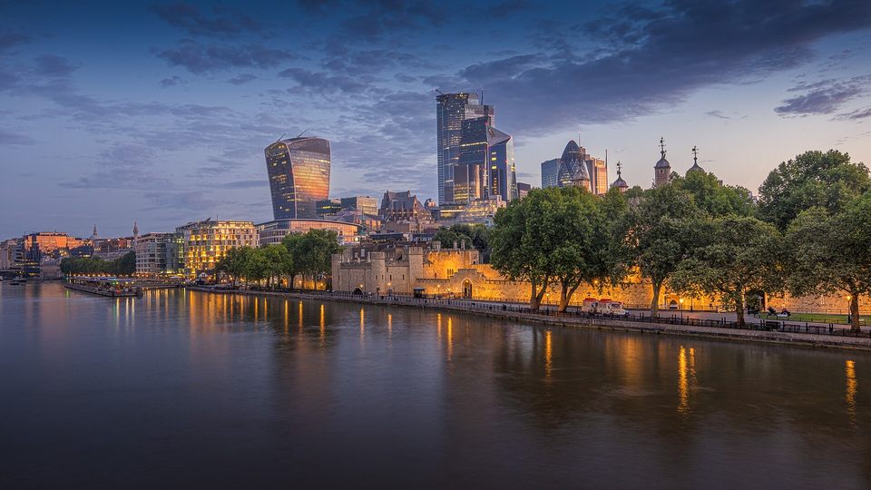 London skyline beside the river at dawn, United Kingdom