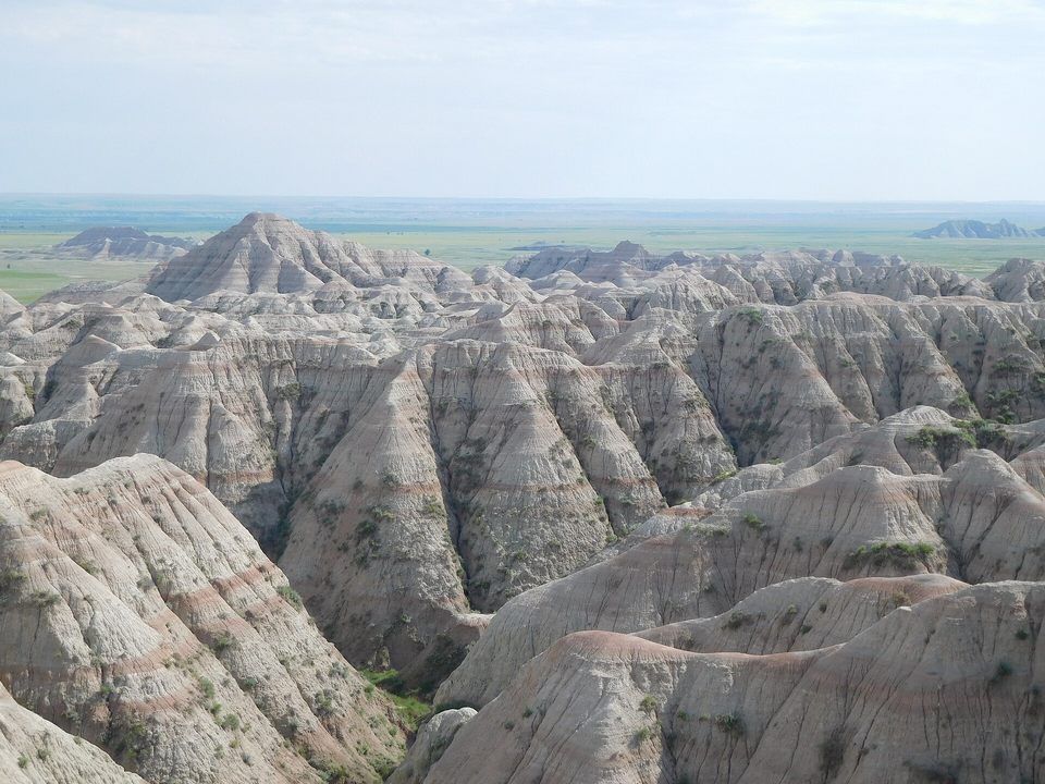 Layered rock formations in the Badlands of South Dakota, United States