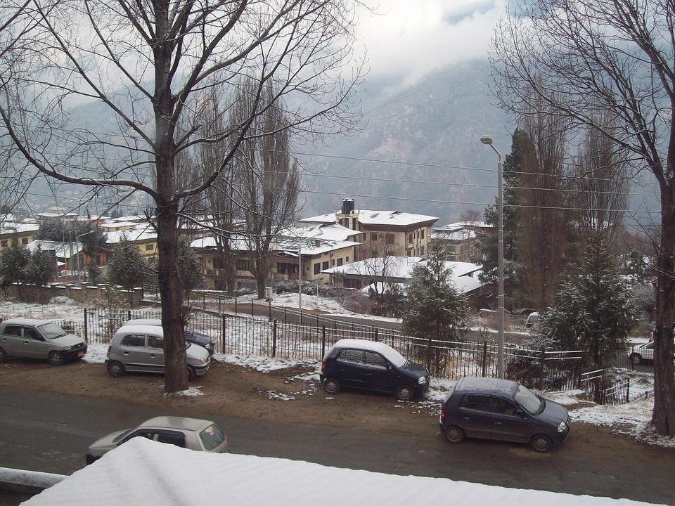 Snow on streets and buildings in Thimphu, Bhutan